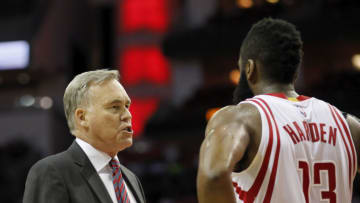 Head coach Mike D'Antoni of the Houston Rockets talks with James Harden #13 of the Houston Rockets (Photo by Tim Warner/Getty Images)