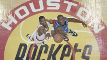 Hakeem Olajuwon Shaquille O'Neal (Photo by Allsport/Getty Images)