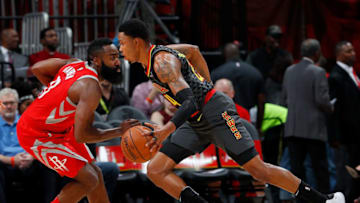 ATLANTA, GA - NOVEMBER 03: Kent Bazemore #24 of the Atlanta Hawks drives against James Harden #13 of the Houston Rockets at Philips Arena on November 3, 2017 in Atlanta, Georgia. NOTE TO USER: User expressly acknowledges and agrees that, by downloading and or using this photograph, User is consenting to the terms and conditions of the Getty Images License Agreement. (Photo by Kevin C. Cox/Getty Images)