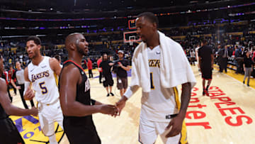 Chris Paul #3 of the Houston Rockets and Kentavious Caldwell-Pope #1 of the Los Angeles Lakers (Photo by Adam Pantozzi/NBAE via Getty Images)