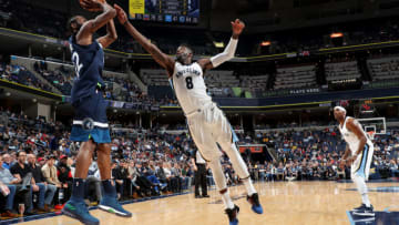 MEMPHIS, TN - DECEMBER 4: Andrew Wiggins #22 of the Minnesota Timbewolves shoots the ball as James Ennis III #8 of the Memphis Grizzlies attempts to block during the game between the two teams on December 4, 2017 at FedEx Forum in Memphis, Tennessee. NOTE TO USER: User expressly acknowledges and agrees that, by downloading and/or using this photograph, user is consenting to the terms and conditions of the Getty Images License Agreement. Mandatory Copyright Notice: Copyright 2017 NBAE (Photo by Joe Murphy/NBAE via Getty Images)