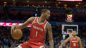 OKLAHOMA CITY, OK - DECEMBER 25: Trevor Ariza #1 of the Houston Rockets brings the ball down court against the Oklahoma City Thunder during the second half of a NBA game at the Chesapeake Energy Arena on December 25, 2017 in Oklahoma City, Oklahoma. The Thunder defeated the Rockets 112-107. NOTE TO USER: User expressly acknowledges and agrees that, by downloading and or using this photograph, User is consenting to the terms and conditions of the Getty Images License Agreement. (Photo by J Pat Carter/Getty Images)