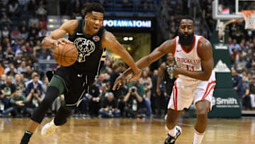 MILWAUKEE, WI - MARCH 07: Giannis Antetokounmpo #34 of the Milwaukee Bucks drives around James Harden #13 of the Houston Rockets during a game at the Bradley Center on March 7, 2018 in Milwaukee, Wisconsin. NOTE TO USER: User expressly acknowledges and agrees that, by downloading and or using this photograph, User is consenting to the terms and conditions of the Getty Images License Agreement. (Photo by Stacy Revere/Getty Images)