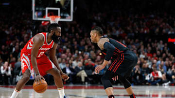 James Harden #13 of the Houston Rockets in action against Damian Lillard #0 of the Portland Trail Blazers (Photo by Jonathan Ferrey/Getty Images)
