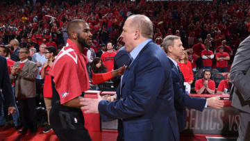 Chris Paul #3 of the Houston Rockets and Head Coach Tom Thibodeau of the Minnesota Timberwolves (Photo by Bill Baptist/NBAE via Getty Images)