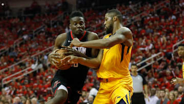 HOUSTON, TX - APRIL 29: Clint Capela #15 of the Houston Rockets drives to the basket defended by Derrick Favors #15 of the Utah Jazz in the second half during Game One of the Western Conference Semifinals of the 2018 NBA Playoffs at Toyota Center on April 29, 2018 in Houston, Texas. NOTE TO USER: User expressly acknowledges and agrees that, by downloading and or using this photograph, User is consenting to the terms and conditions of the Getty Images License Agreement. (Photo by Tim Warner/Getty Images)