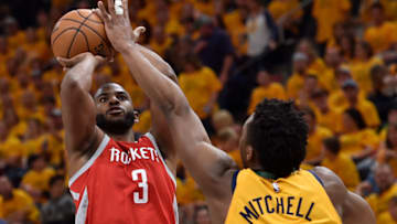 SALT LAKE CITY, UT - MAY 06: Chris Paul #3 of the Houston Rockets shoots over Donovan Mitchell #45 of the Utah Jazz in the second half during Game Four of Round Two of the 2018 NBA Playoffs at Vivint Smart Home Arena on May 6, 2018 in Salt Lake City, Utah. The Rockets beat the Jazz 100-87. NOTE TO USER: User expressly acknowledges and agrees that, by downloading and or using this photograph, User is consenting to the terms and conditions of the Getty Images License Agreement. (Photo by Gene Sweeney Jr./Getty Images)