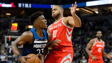MINNEAPOLIS, MN - APRIL 21: Eric Gordon #10 of the Houston Rockets defends Jimmy Butler #23 of the Minnesota Timberwolves in Game Three of Round One of the 2018 NBA Playoffs on April 21, 2018 at the Target Center in Minneapolis, Minnesota. The Timberwolves defeated 121-105. NOTE TO USER: User expressly acknowledges and agrees that, by downloading and or using this Photograph, user is consenting to the terms and conditions of the Getty Images License Agreement. (Photo by Hannah Foslien/Getty Images)