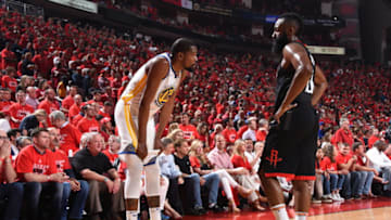 HOUSTON, TX - MAY 28: Kevin Durant #35 of the Golden State Warriors and James Harden #13 of the Houston Rockets during Game Seven of the Western Conference Finals of the 2018 NBA Playoffs on May 28, 2018 at the Toyota Center in Houston, Texas. NOTE TO USER: User expressly acknowledges and agrees that, by downloading and or using this photograph, User is consenting to the terms and conditions of the Getty Images License Agreement. Mandatory Copyright Notice: Copyright 2018 NBAE (Photo by Andrew D. Bernstein/NBAE via Getty Images)
