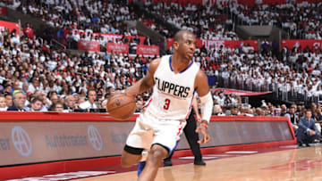LOS ANGELES, CA - APRIL 18: Chris Paul #3 of the LA Clippers handles the ball against the Utah Jazz during Game Two of the Western Conference Quarterfinals of the 2017 NBA Playoffs on April 18, 2017 at STAPLES Center in Los Angeles, California. NOTE TO USER: User expressly acknowledges and agrees that, by downloading and/or using this photograph, user is consenting to the terms and conditions of the Getty Images License Agreement. Mandatory Copyright Notice: Copyright 2017 NBAE (Photo by Andrew D. Bernstein/NBAE via Getty Images)
