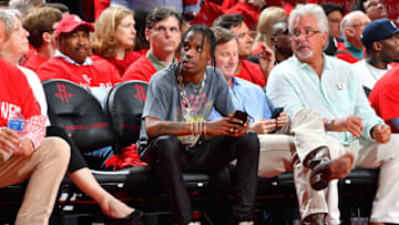 HOUSTON, TX - MAY 11: Rapper, Travis Scott is seen at the game between the Houston Rockets and the San Antonio Spurs during Game Six of the Western Conference Semifinals of the 2017 NBA Playoffs on May 11, 2017 at the Toyota Center in Houston, Texas. NOTE TO USER: User expressly acknowledges and agrees that, by downloading and or using this photograph, User is consenting to the terms and conditions of the Getty Images License Agreement. Mandatory Copyright Notice: Copyright 2017 NBAE (Photo by Jesse D. Garrabrant/NBAE via Getty Images)