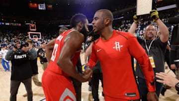 OAKLAND, CA - OCTOBER 17: James Harden #13 and Chris Paul #3 of the Houston Rockets high five after the game against the Golden State Warriors on October 17, 2017 at ORACLE Arena in Oakland, California. NOTE TO USER: User expressly acknowledges and agrees that, by downloading and or using this photograph, user is consenting to the terms and conditions of Getty Images License Agreement. Mandatory Copyright Notice: Copyright 2017 NBAE (Photo by Andrew D. Bernstein/NBAE via Getty Images)