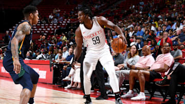 Chris Clemons #59 of the Houston Rockets handles the ball against the Utah Jazz (Photo by Garrett Ellwood/NBAE via Getty Images)