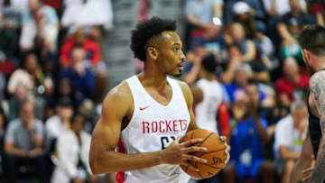 Johnathan Williams #61 of the Houston Rockets handles the ball during a game against the Dallas Mavericks at NBA Summer League (Photo by Cassy Athena/Getty Images)
