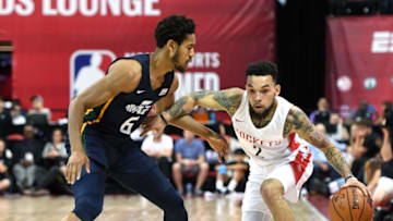 Chris Chiozza #2 of the Houston Rockets drives against Isaiah Cousins #6 of the Utah Jazz (Photo by Ethan Miller/Getty Images)