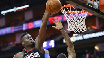 D.J. Augustin #14 of the Orlando Magic has his shot blocked by Clint Capela #15 of the Houston Rockets (Photo by Bob Levey/Getty Images)
