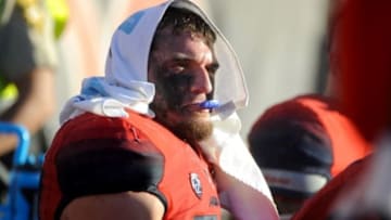 Nov 28, 2014; Tucson, AZ, USA; Arizona Wildcats linebacker Scooby Wright III (33) sits on the bench during the fourth quarter of the territorial cup against the Arizona State Sun Devils at Arizona Stadium. The Wildcats won 42-35. Mandatory Credit: Casey Sapio-USA TODAY Sports