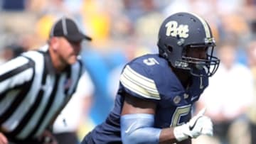 Sep 10, 2016; Pittsburgh, PA, USA; Pittsburgh Panthers defensive lineman Ejuan Price (5) breaks off of the line scrimmage against the Penn State Nittany Lions during the third quarter at Heinz Field. PITT won 42-39. Mandatory Credit: Charles LeClaire-USA TODAY Sports