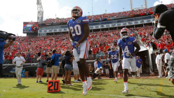 Oct 29, 2016; Jacksonville, FL, USA; Florida Gators defensive back Marcus Maye (20), wide receiver Brandon Powell (4) and teammates run out of the tunnel before the game against the Georgia Bulldogs at EverBank Field. Mandatory Credit: Kim Klement-USA TODAY Sports