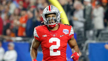 GLENDALE, ARIZONA - DECEMBER 28: J.K. Dobbins #2 of the Ohio State Buckeyes celebrates after her runs the ball for 68-yard a touchdown against the Clemson Tigers in the first half during the College Football Playoff Semifinal at the PlayStation Fiesta Bowl at State Farm Stadium on December 28, 2019 in Glendale, Arizona. (Photo by Ralph Freso/Getty Images)
