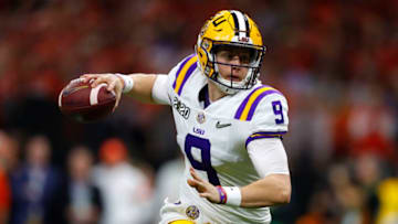 NEW ORLEANS, LOUISIANA - JANUARY 13: Joe Burrow #9 of the LSU Tigers throws the ball under pressure against the Clemson Tigers during the College Football Playoff National Championship game at Mercedes Benz Superdome on January 13, 2020 in New Orleans, Louisiana. (Photo by Jonathan Bachman/Getty Images)