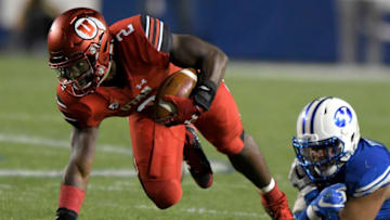 PROVO, UT - SEPTEMBER 9: Zack Moss #2 of the Utah Utes breaks a tackle during their game against the Brigham Young Cougars at LaVell Edwards Stadium on September 9, 2017 in Provo, Utah. (Photo by Gene Sweeney Jr/Getty Images)