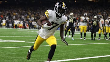 NEW ORLEANS, LOUISIANA - DECEMBER 23: Eli Rogers #17 of the Pittsburgh Steelers scores a two-point conversion during the first half against the New Orleans Saints at the Mercedes-Benz Superdome on December 23, 2018 in New Orleans, Louisiana. (Photo by Chris Graythen/Getty Images)