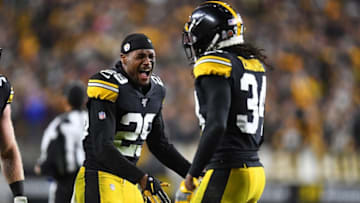 PITTSBURGH, PA - NOVEMBER 10: Kam Kelly #29 of the Pittsburgh Steelers celebrates with Terrell Edmunds #34 after making a stop on fourth down during the fourth quarter against the Los Angeles Rams at Heinz Field on November 10, 2019 in Pittsburgh, Pennsylvania. (Photo by Joe Sargent/Getty Images)