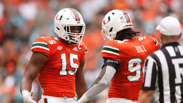 Gregory Rousseau Miami Hurricanes Trevon Hill (Photo by Michael Reaves/Getty Images)