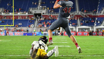 BOCA RATON, FLORIDA - NOVEMBER 30: Harrison Bryant #40 of the Florida Atlantic Owls catches his third touchdown against the Southern Miss Golden Eagles in the second half at FAU Stadium on November 30, 2019 in Boca Raton, Florida. (Photo by Mark Brown/Getty Images)
