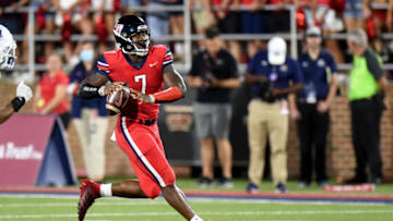 LYNCHBURG, VIRGINIA - SEPTEMBER 18: Malik Willis #7 of the Liberty Flames drops back to pass against the Old Dominion Monarchs at Williams Stadium on September 18, 2021 in Lynchburg, Virginia. (Photo by G Fiume/Getty Images)