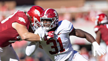 Will Anderson Jr. #31 of the Alabama Crimson Tide at the line of scrimmage during a game against the Arkansas Razorbacks at Donald W. Reynolds Razorback Stadium on October 1, 2022 in Fayetteville, Arkansas. The Crimson Tide defeated the Razorbacks 49-26. (Photo by Wesley Hitt/Getty Images)