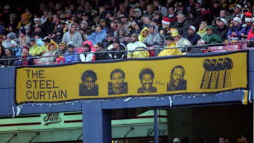 PITTSBURGH - DECEMBER 16: A sign for the Steel Curtain, (a name given to the defensive line of the Pittsburgh Steelers in the 1970s) from left, Dwight White, Ernie Holmes, Joe Greene and L.C. Greenwood, hangs from the stands during a game against the Washington Redskins at Three Rivers Stadium on December 16, 2000 in Pittsburgh, Pennsylvania. (Photo by George Gojkovich/Getty Images)