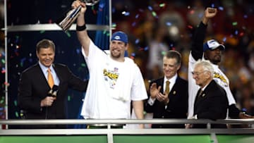 TAMPA - FEBRUARY 1: Quarterback Ben Roethlisberger #7 of the Pittsburgh Steelers hoists the Lombardi Trophy after his team's 27-23 victory over the Arizona Cardinals during Super Bowl XLIII at Raymond James Stadium on February 1, 2009 in Tampa, Florida. (Photo by Donald Miralle/Getty Images)