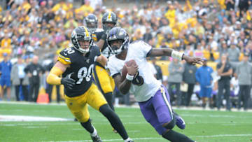 Baltimore Ravens quarterback Lamar Jackson (8) and Pittsburgh Steelers linebacker T.J. Watt (90) Mandatory Credit: Philip G. Pavely-USA TODAY Sports