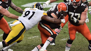 Jan 3, 2021; Cleveland, Ohio, USA; Pittsburgh Steelers defensive end Stephon Tuitt (91) sacks Cleveland Browns quarterback Baker Mayfield (6) (Photo Credit: Ken Blaze-USA TODAY Sports)