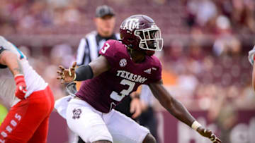 Sep 18, 2021; College Station, Texas, USA; Texas A&M Aggies defensive lineman Tyree Johnson (3) in action during the game between the Texas A&M Aggies and the New Mexico Lobos at Kyle Field. Mandatory Credit: Jerome Miron-USA TODAY Sports