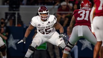 Sep 25, 2021; Arlington, Texas, USA; Texas A&M Aggies offensive lineman Kenyon Green (55) in action during the game between the Arkansas Razorbacks and the Texas A&M Aggies at AT&T Stadium. Mandatory Credit: Jerome Miron-USA TODAY Sports