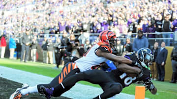 Nov 27, 2016; Baltimore, MD, USA; Baltimore Ravens wide receiver Breshad Perriman (18) catches a touchdown over Cincinnati Bengals cornerback Darqueze Dennard (21) in the first quarter at M&T Bank Stadium. Mandatory Credit: Evan Habeeb-USA TODAY Sports