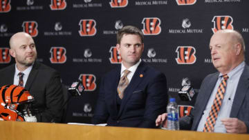 CINCINNATI, OH - FEBRUARY 05: Zac Taylor speaks to the media as director of player personnel Duke Tobin (left) and owner Mike Brown (right) look on after being introduced as the new head coach for the Cincinnati Bengals at Paul Brown Stadium on February 5, 2019 in Cincinnati, Ohio. (Photo by Joe Robbins/Getty Images)