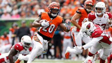 CINCINNATI, OH - OCTOBER 6: Joe Mixon #28 of the Cincinnati Bengals runs the ball past Jalen Thompson #34 of the Arizona Cardinals during the first quarter at Paul Brown Stadium on October 6, 2019 in Cincinnati, Ohio. (Photo by Kirk Irwin/Getty Images)