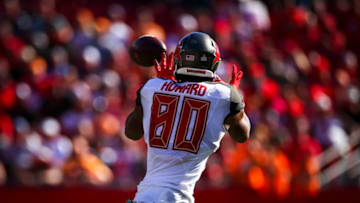 TAMPA, FL - NOVEMBER 10: O.J. Howard #80 of the Tampa Bay Buccaneers hauls in a pass from Jameis Winston #3 during the game against the Arizona Cardinals on November 10, 2019 at Raymond James Stadium in Tampa, Florida. (Photo by Will Vragovic/Getty Images)