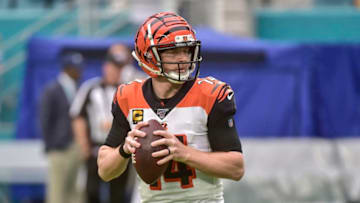 MIAMI, FLORIDA - DECEMBER 22: Andy Dalton #14 of the Cincinnati Bengals warms up before the start of the game against the Miami Dolphins at Hard Rock Stadium on December 22, 2019 in Miami, Florida. (Photo by Eric Espada/Getty Images)