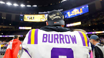 NEW ORLEANS, LOUISIANA - JANUARY 13: Joe Burrow #9 of the LSU Tigers celebrates after defeating the Clemson Tigers 42-25 in the College Football Playoff National Championship game at Mercedes Benz Superdome on January 13, 2020 in New Orleans, Louisiana. (Photo by Kevin C. Cox/Getty Images)