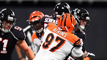 ATLANTA, GA - SEPTEMBER 30: Matt Ryan #2 of the Atlanta Falcons is sacked by Geno Atkins #97 of the Cincinnati Bengals during the second quarter at Mercedes-Benz Stadium on September 30, 2018 in Atlanta, Georgia. (Photo by Scott Cunningham/Getty Images)