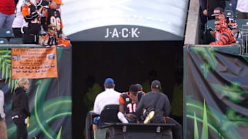 CINCINNATI, OH - DECEMBER 2: A.J. Green #18 of the Cincinnati Bengals is carted off of the field after injuring his foot during the second quarter of the game against the Cincinnati Bengals at Paul Brown Stadium on December 2, 2018 in Cincinnati, Ohio. (Photo by John Grieshop/Getty Images)