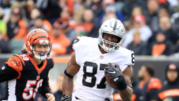 CINCINNATI, OH - DECEMBER 16: Jared Cook #87 of the Oakland Raiders runs with the ball against the Cincinnati Bengals at Paul Brown Stadium on December 16, 2018 in Cincinnati, Ohio. (Photo by Andy Lyons/Getty Images)