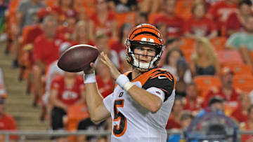 KANSAS CITY, MO - AUGUST 10: Ryan Finley #5 of the Cincinnati Bengals drops back to pass during the third quarter against the Kansas City Chiefs at Arrowhead Stadium on August 10, 2019 in Kansas City, Missouri. (Photo by Peter Aiken/Getty Images)