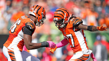 CINCINNATI, OH - OCTOBER 4: Dre Kirkpatrick #27 of the Cincinnati Bengals congratulates Carlos Dunlap #96 of the Cincinnati Bengals after sacking Alex Smith #11 of the Kansas City Chiefs during the third quarter at Paul Brown Stadium on October 4, 2015 in Cincinnati, Ohio. (Photo by Joe Robbins/Getty Images)