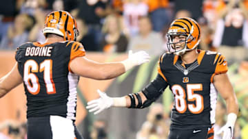 CINCINNATI, OH - NOVEMBER 5: Tyler Eifert #85 of the Cincinnati Bengals is congratulated by Russell Bodine #61 of the Cincinnati Bengals after scoring a touchdown during the second quarter of the game against the Cleveland Browns at Paul Brown Stadium on November 5, 2015 in Cincinnati, Ohio. (Photo by Andy Lyons/Getty Images)
